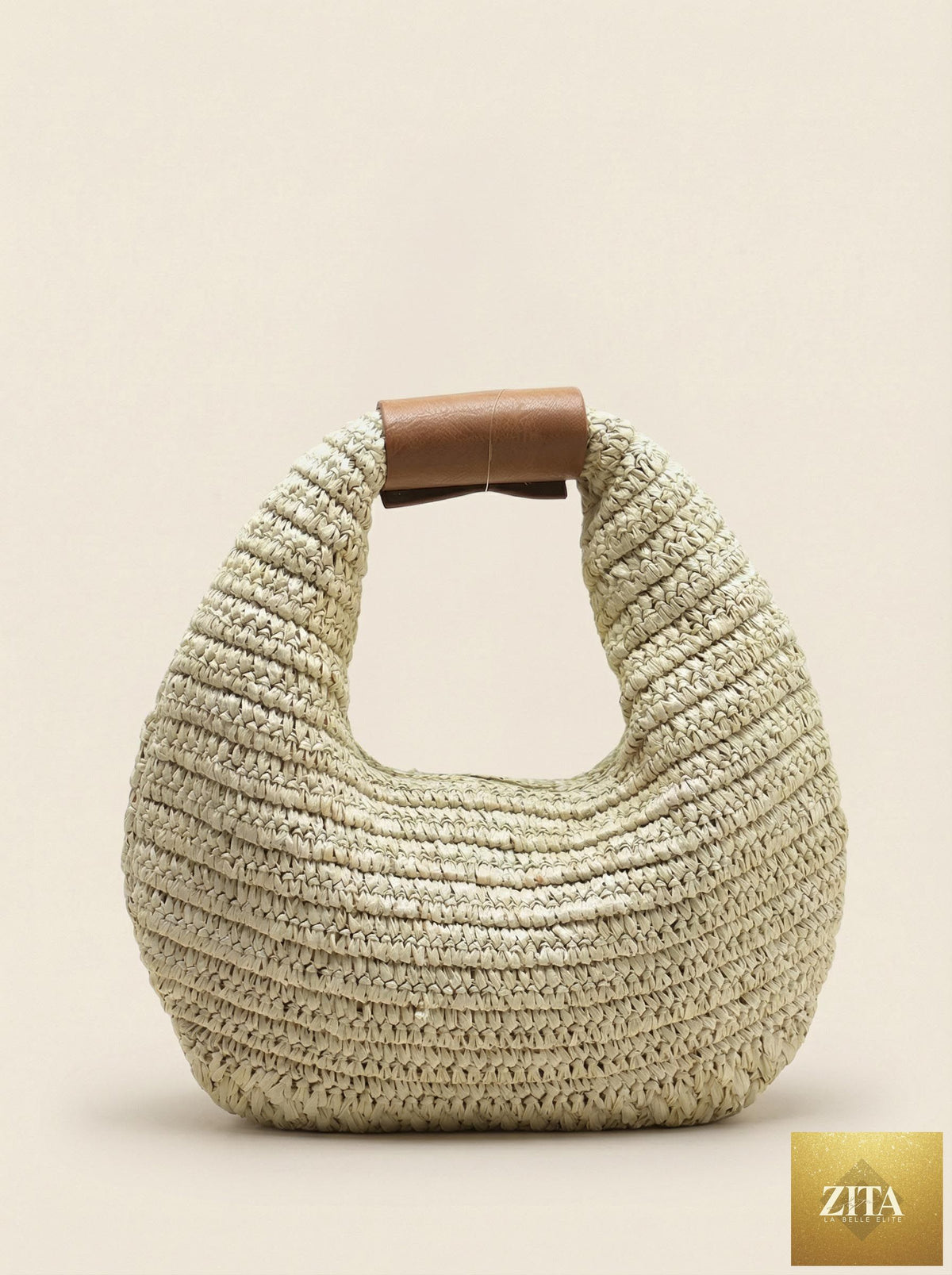 Round crochet woven straw handbag by LINTICO featuring a handheld tote style with a circular woven design.