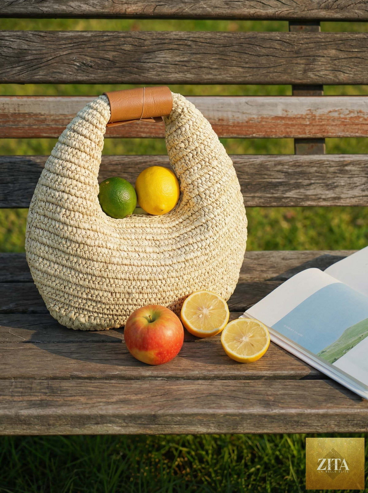 Round crochet woven straw handbag by LINTICO, handheld tote bag with a natural woven texture and round shape.