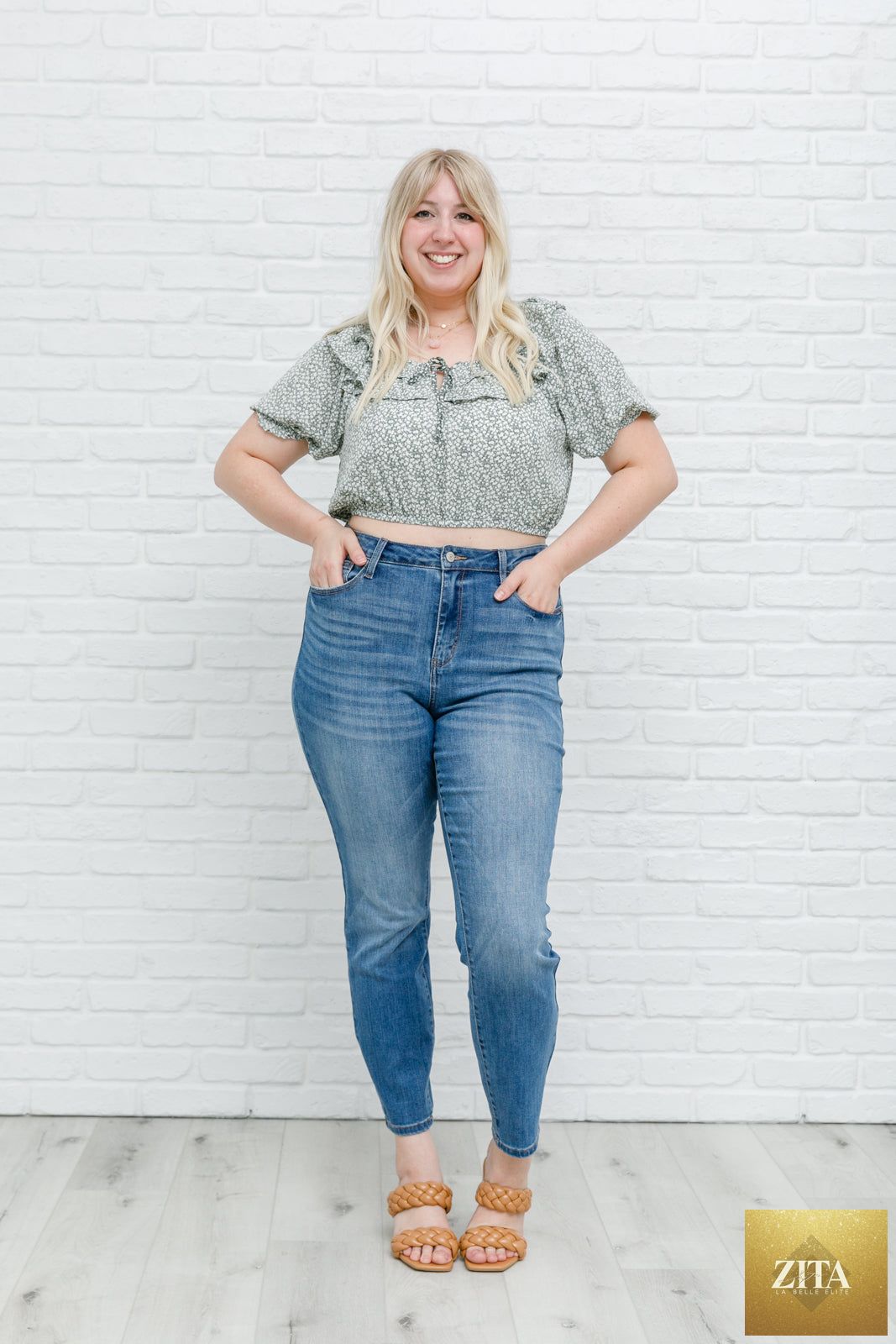 Women's Golden Hour Top in Sage by Thread & Co. Boutique, LLC, featuring a stylish sleeveless design and relaxed fit.