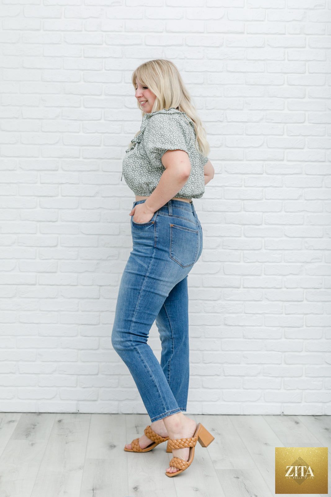 Women's Golden Hour Top in Sage from Thread & Co. Boutique, LLC, featuring a stylish, lightweight fabric and relaxed fit.