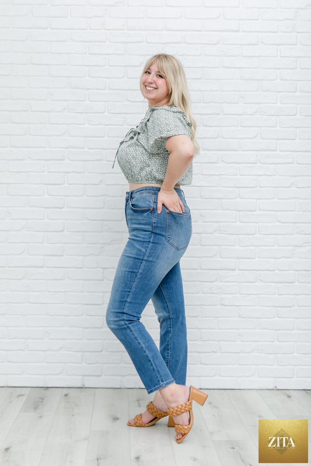 Womens Golden Hour Top in Sage by Thread & Co. Boutique, LLC, featuring a stylish sleeveless design and relaxed fit.