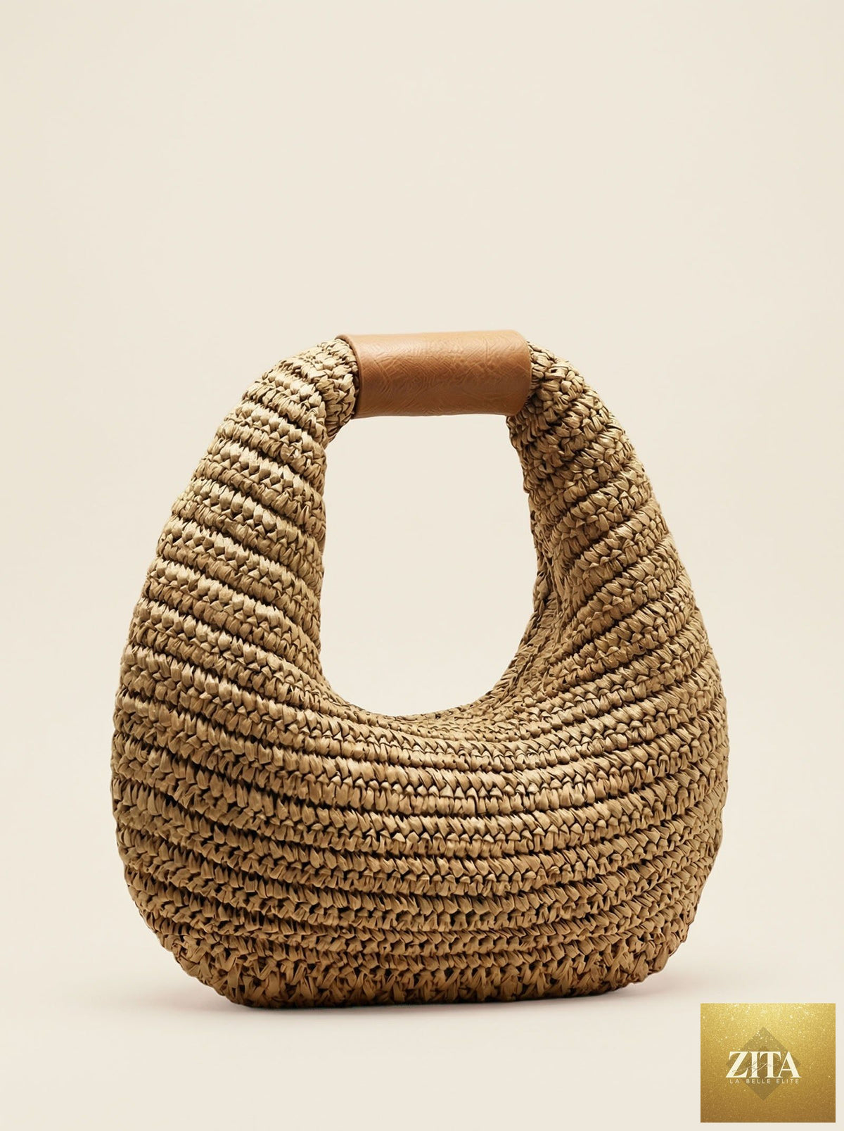 Round crochet woven straw handbag by LINTICO, featuring a handheld tote style with intricate woven straw design.