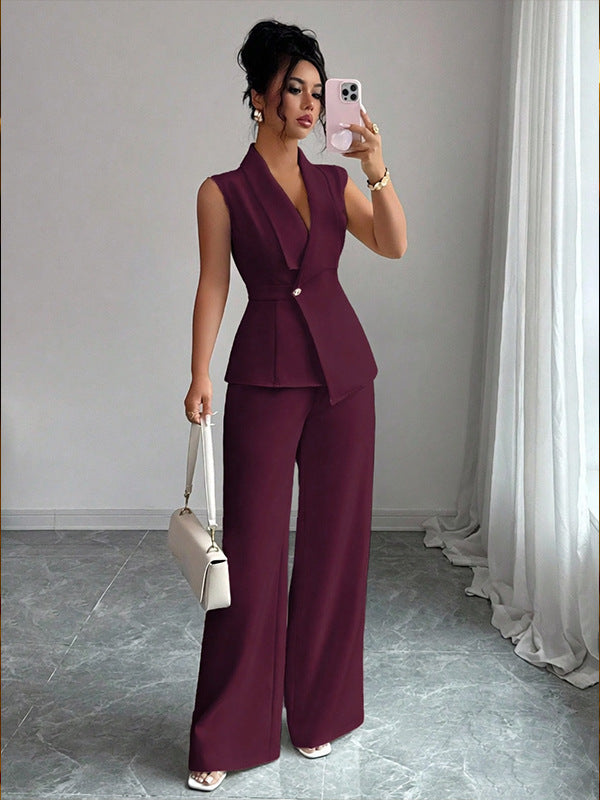 Women's sleeveless blazer and straight-leg pants two-piece casualwear set by FitiqueFit, shown in a stylish, coordinated outfit.