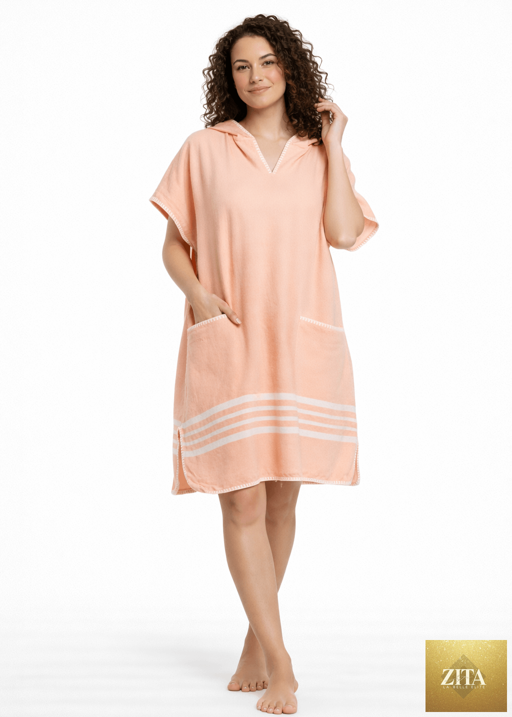 Zita La Belle Elite beach cover-up poncho with hood in vibrant melon color, lightweight and stylish for seaside wear.