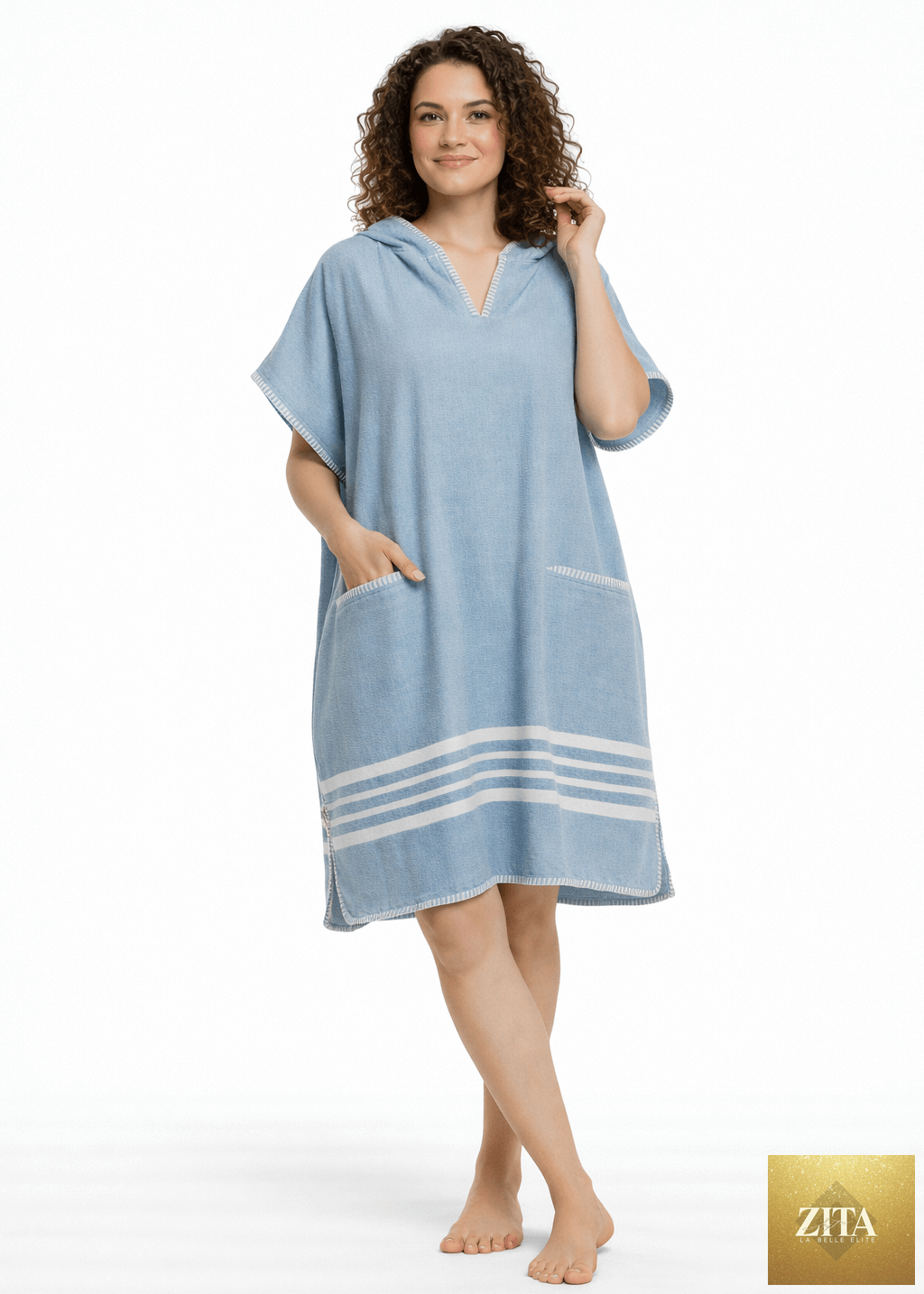 Light blue Zita La Belle Elite beach cover-up poncho with hood, lightweight and stylish for seaside or poolside wear.