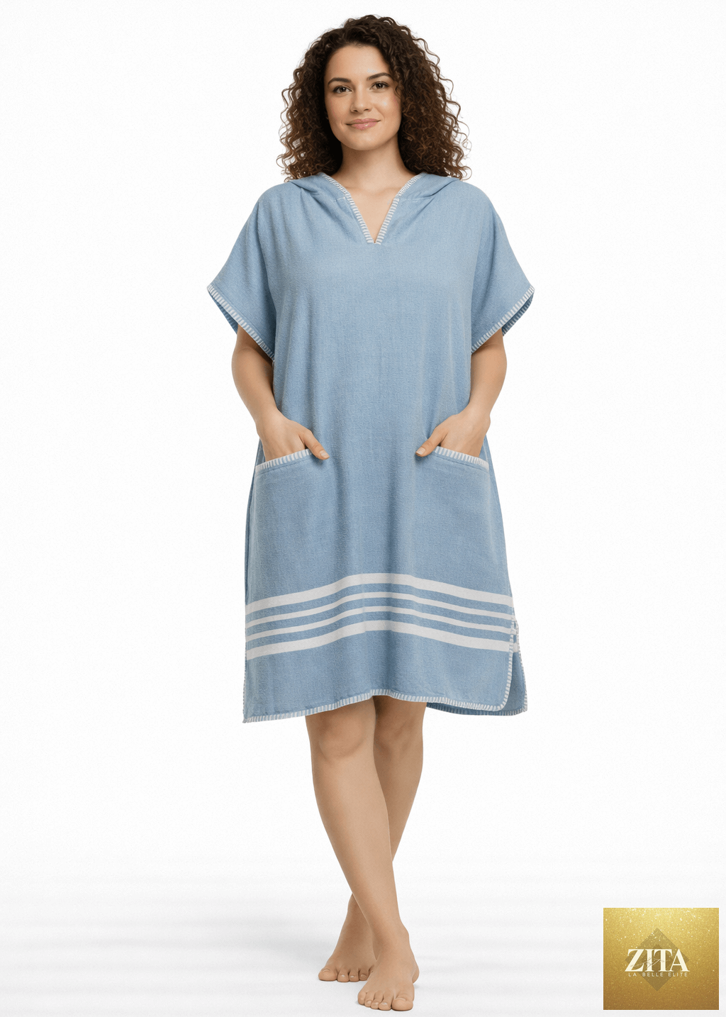 Light blue Zita La Belle Elite beach cover-up poncho with hood, lightweight and stylish for seaside wear.
