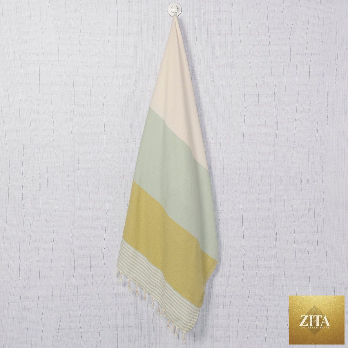Multi color Turkish towel bundle by Zita La Belle Elite, showing vibrant mint green and other colorful Turkish towels.
