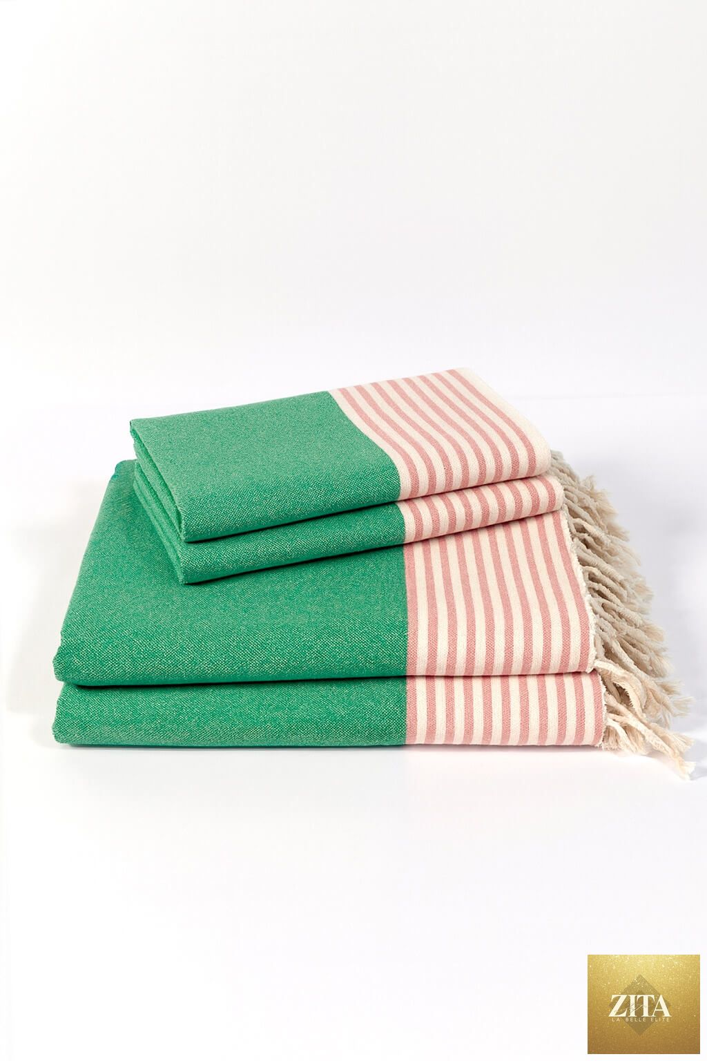 Multi-color Turkish towel bundle from Zita La Belle Elite featuring pink, green, and other vibrant hues, displayed folded and draped.