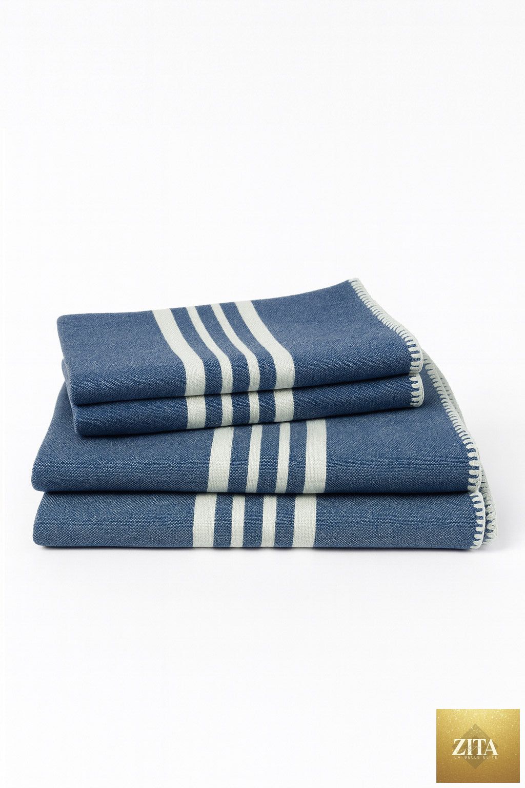 Bundle of navy blue Buldano Turkish farm house towels without fringe, showcasing soft, woven Turkish towels for home or beach use.