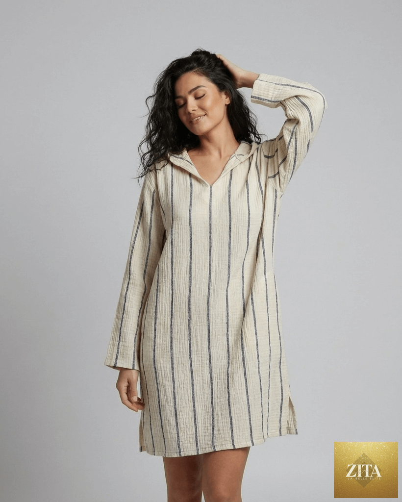 Navy long sleeve poncho beach cover-up by Buldano, lightweight and comfortable, with a relaxed fit and stylish design.
