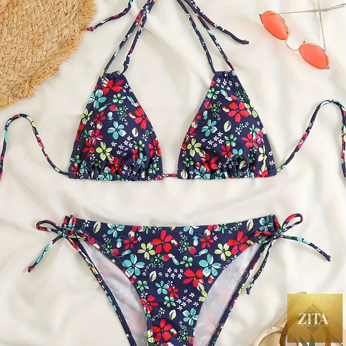 Stevvex Sunset Bloom bikini set for women with vibrant floral print, halter neck, tie-back, and high-cut tie-side bottoms.