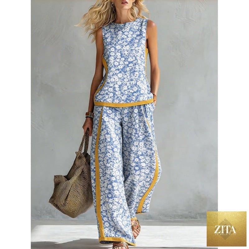 Printed retro sleeveless top and wide-leg pants set by FitiqueFit, featuring vibrant 12-print design in various sizes.