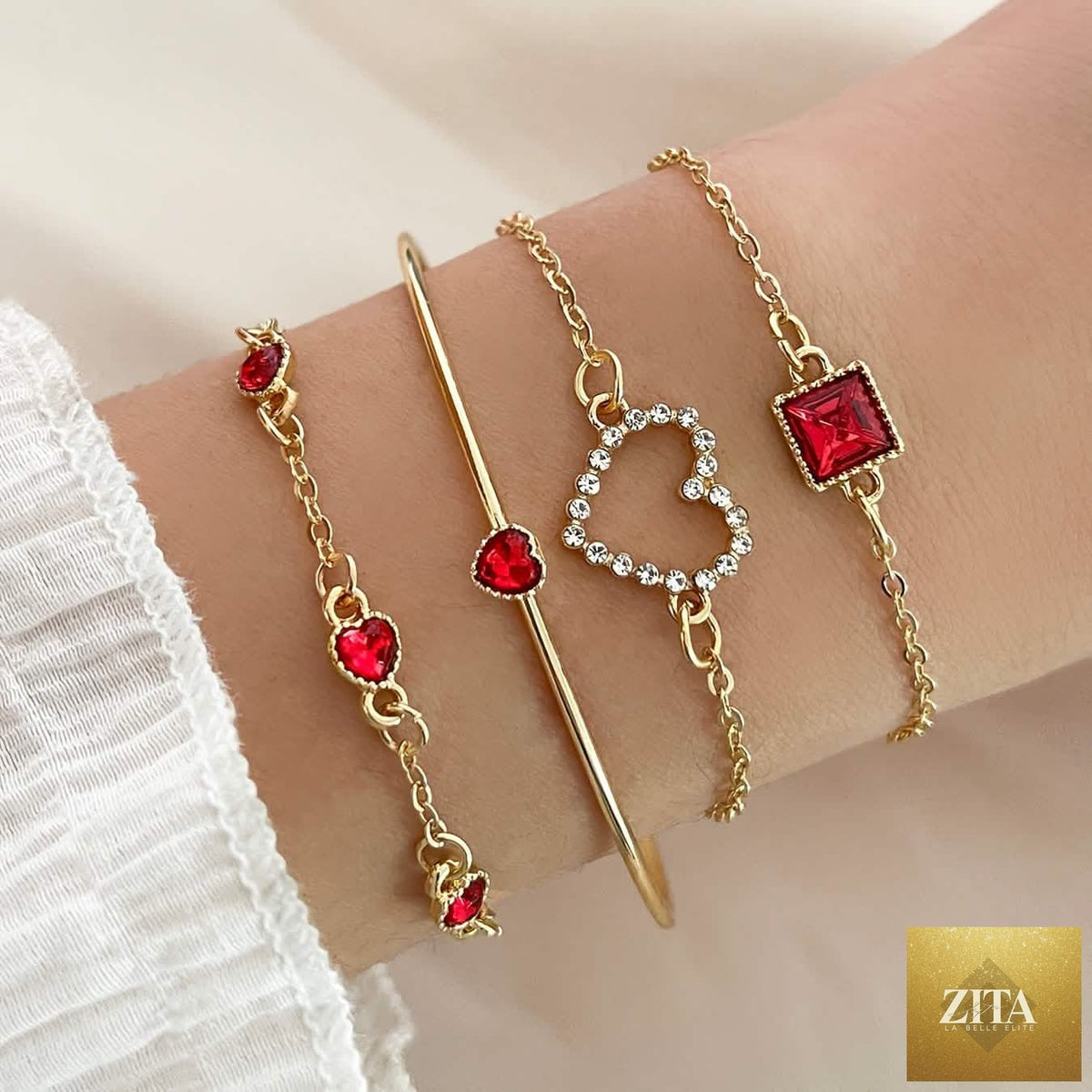 Four-piece rhinestone alloy bracelet set featuring minimalist heart and square designs, stylish jewelry for women.