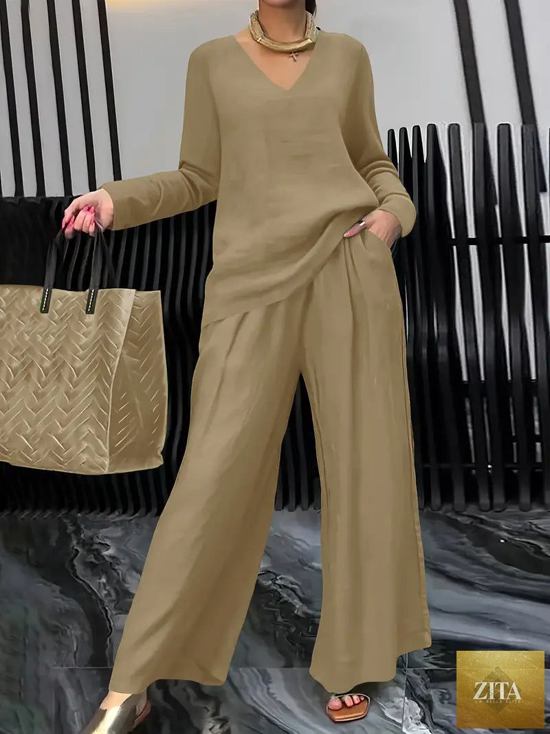 FitiqueFit solid color long sleeve top and pants two-piece travel set, casual and comfortable clothing for travel or lounging.