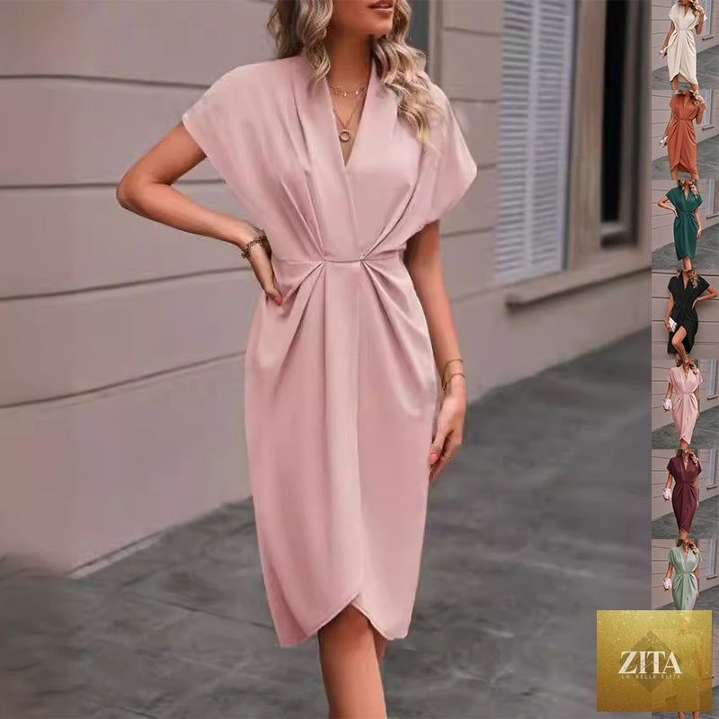 V-neck sleeveless pleated A-line midi dress by FitiqueFit, perfect for summer, shown in a stylish and flowing design.