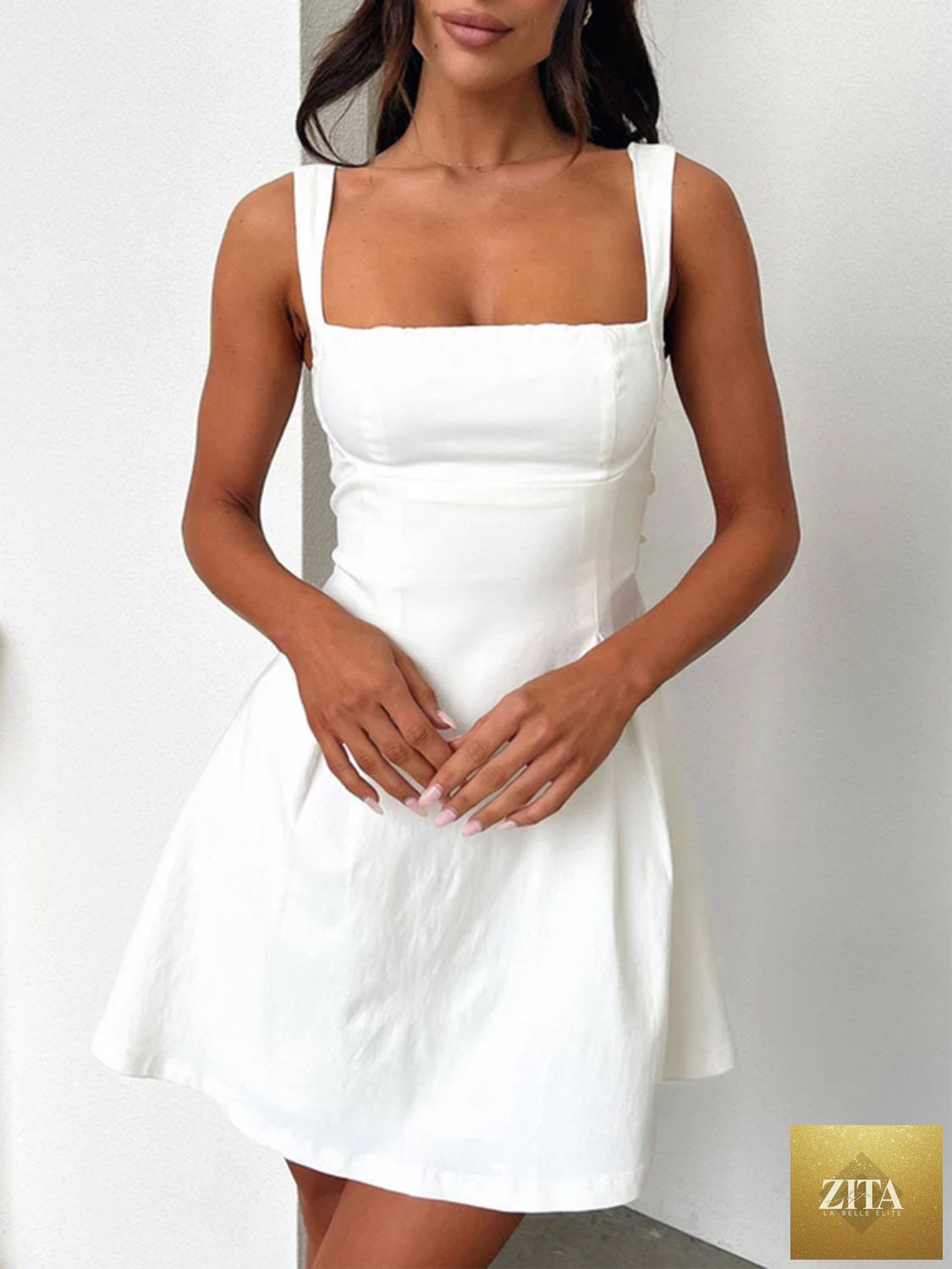 Dark blue Stevvex mini dress with bow back and square neckline, feminine and flattering for girls, stylish and elegant.
