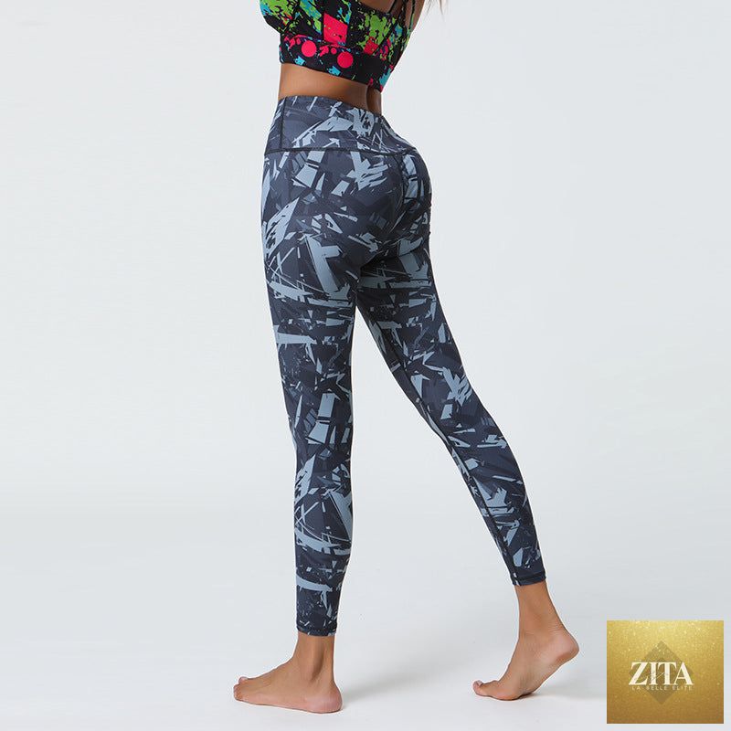 Women's high-waisted stretchy printed yoga fitness pants, comfortable athletic leggings for yoga and workout sessions.