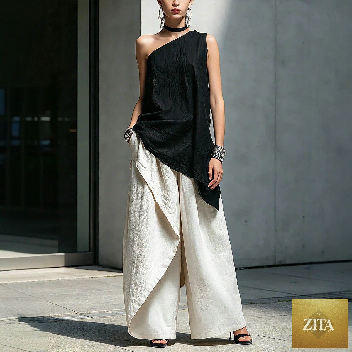 Zita La Belle Elite women's one-shoulder asymmetric sleeveless top in black, showcasing a stylish and modern design.