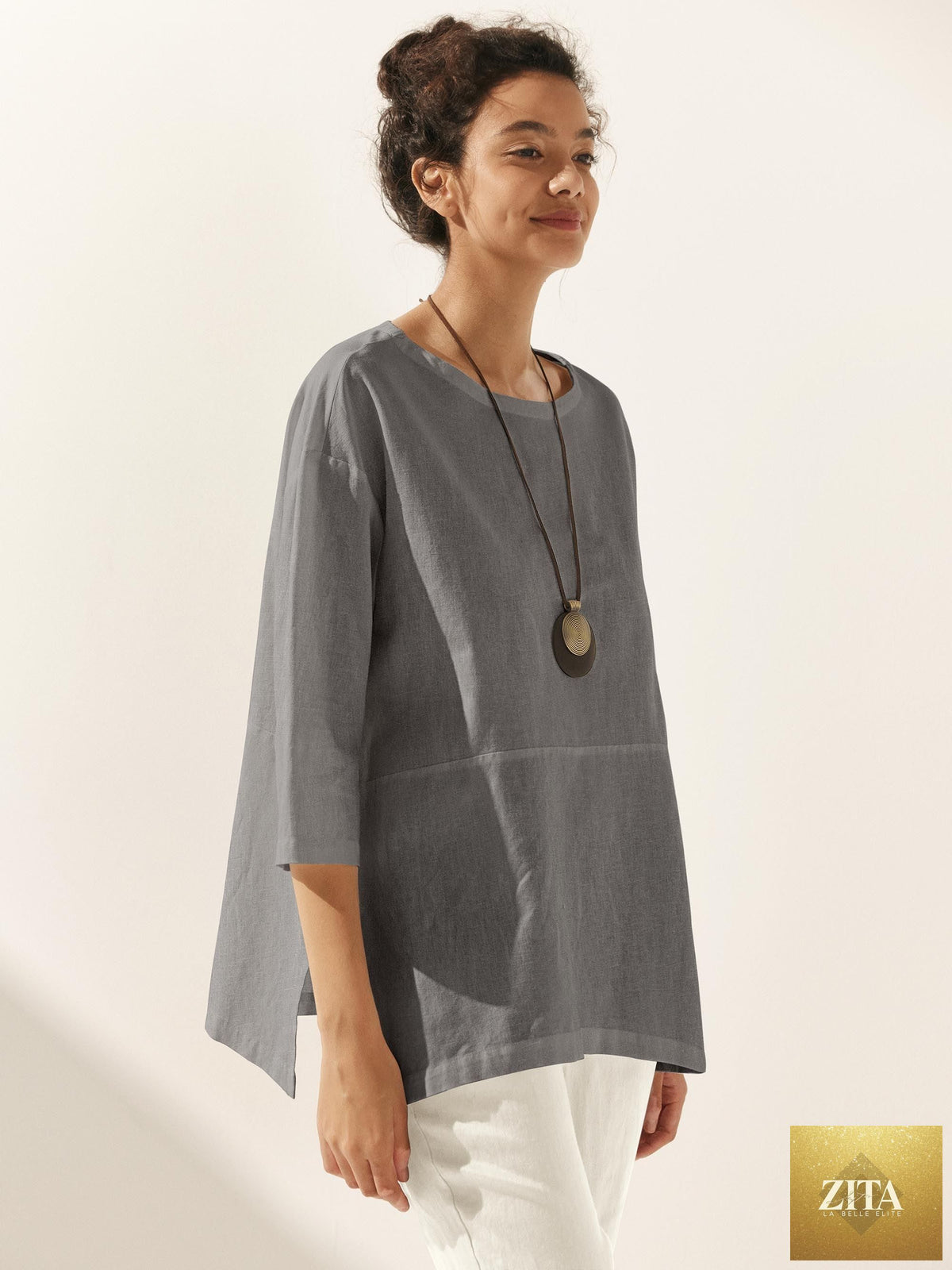 LINTICO Linen White Boat Neck Oversized Top, front view showcasing relaxed fit and lightweight linen-blend fabric.