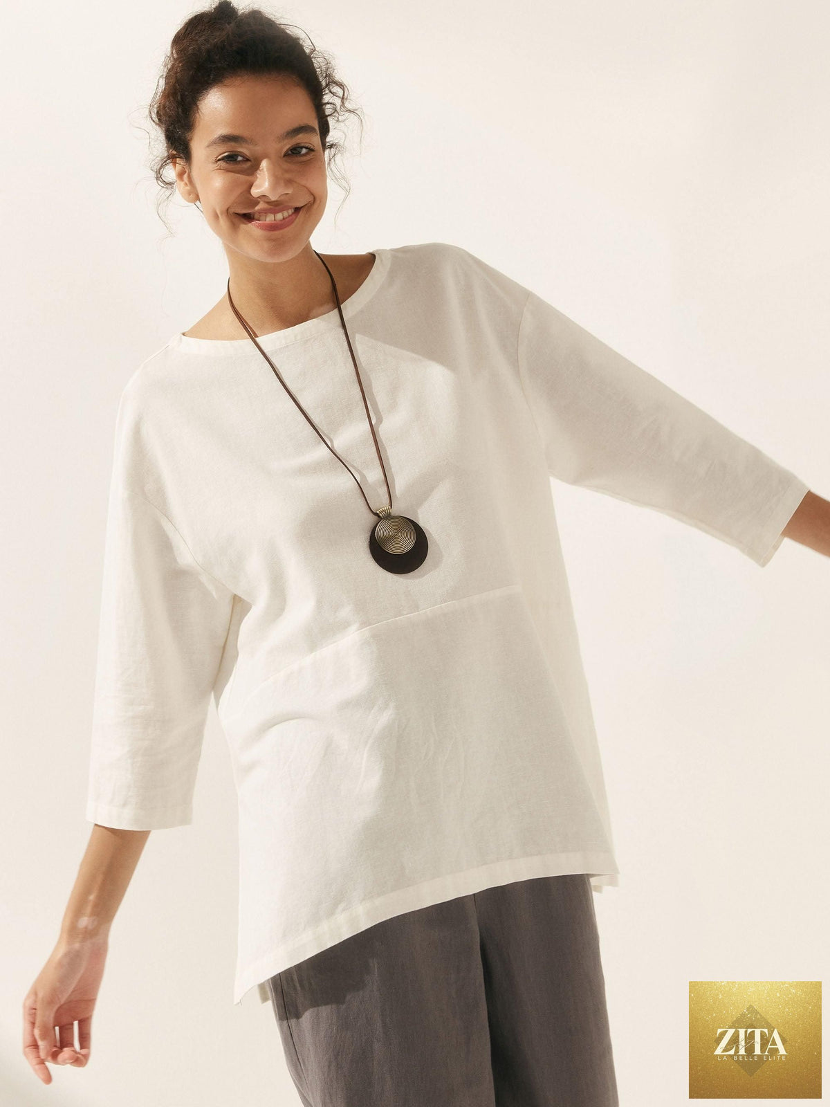 LINTICO Linen White Boat Neck Oversized Top, a natural-fit linen blend blouse with a relaxed boat neckline and oversized style.