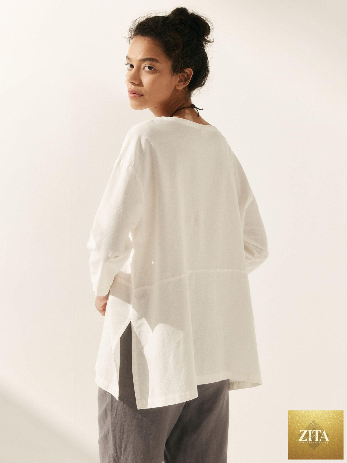 LINTICO linen white boat neck oversized top, flowy blouse made from linen blend fabric, with a relaxed fit and boat neckline.