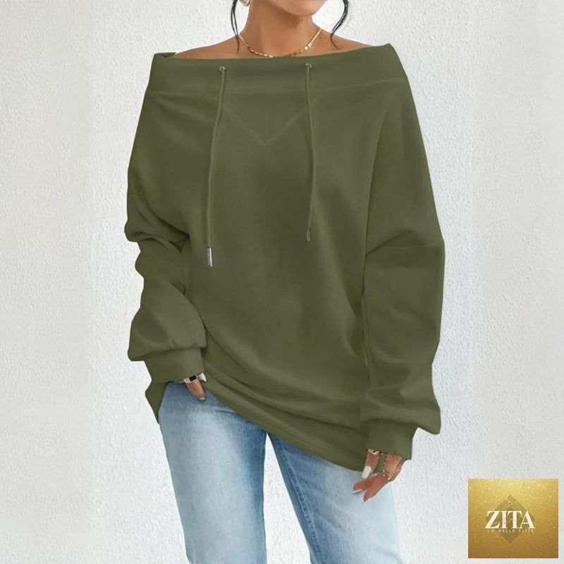 Plus size off shoulder pullover by Zita La Belle Elite, casualwear in soft fabric, styled on a model with relaxed fit and wide neckline.