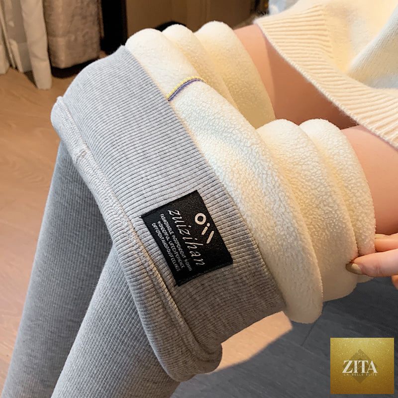 Women’s fleece-lined high-waist winter leggings by FitiqueFit, made of lambswool for warmth and comfort.
