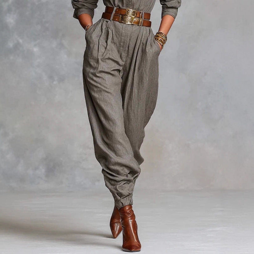 Women's long-sleeved lapel jumpsuit featuring a tailored fit, stylish design, and front pockets, perfect for casual or formal wear.