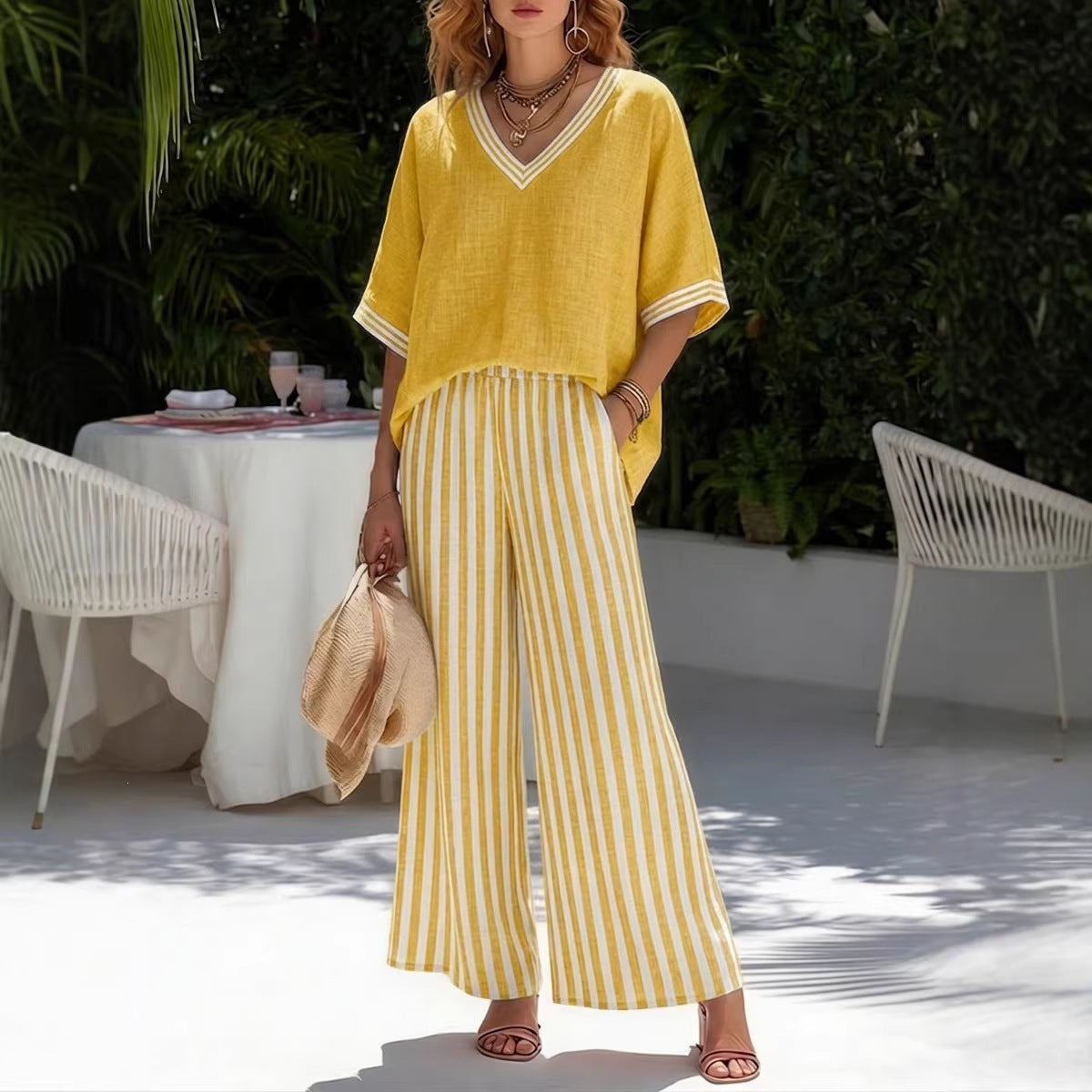 Women's striped tunic top and casual trousers two-piece set from FitiqueFit, featuring comfortable, stylish casualwear for everyday wear.