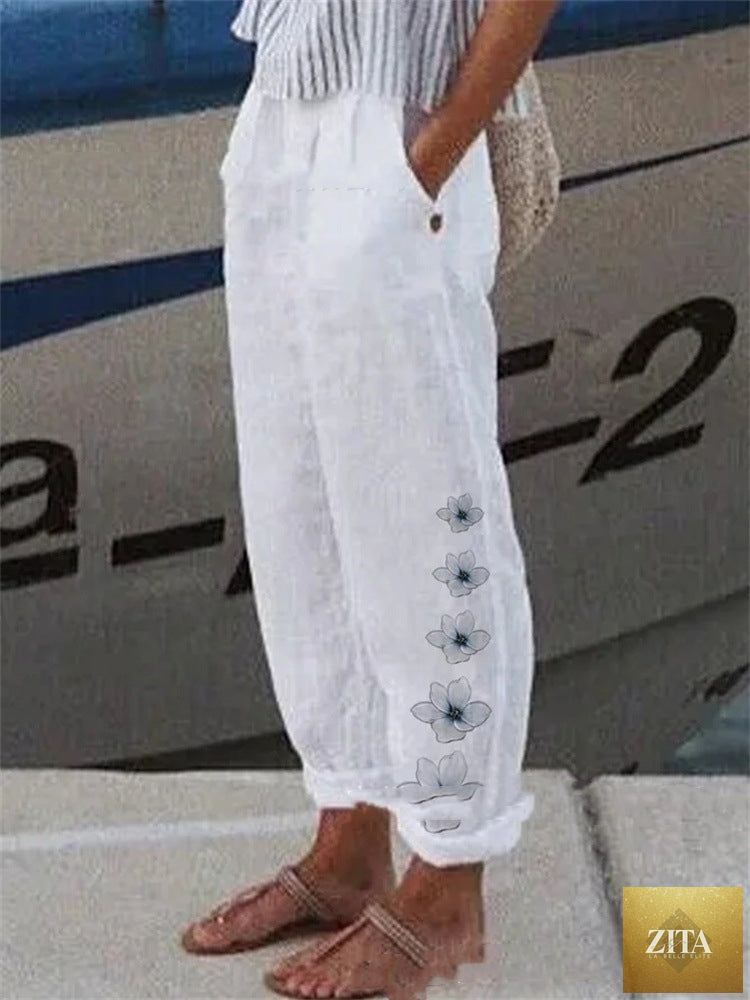 Women's high-waisted cotton-linen casual pants, breathable and stylish, shown in natural fabric and relaxed fit design.