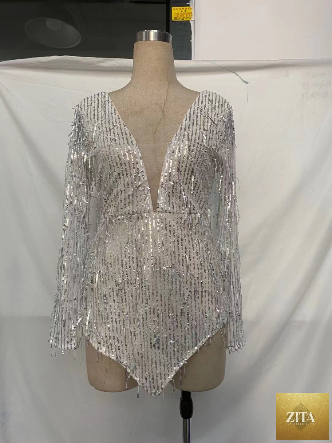 Adult FLIPSTYLEZLLC V-neck long sleeve beach dress with knee length, backless lace design, perfect for summer or beachwear.