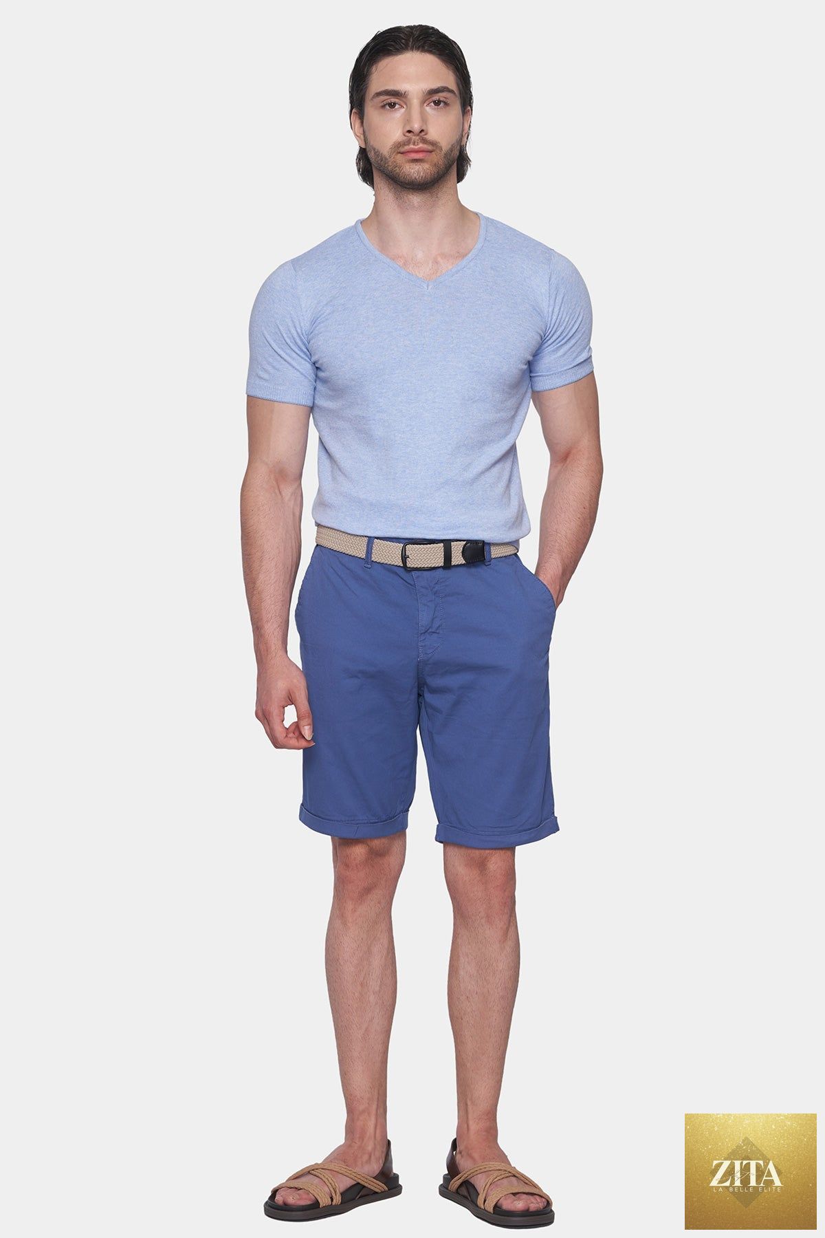 Oily blue summer shorts by Bright Moons featuring lightweight fabric and casual style, shown laid flat in the image.