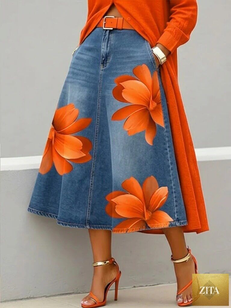 Women's floral print denim-style boho A-line midi skirt by FitiqueFit, featuring a flowy silhouette and vibrant floral pattern.