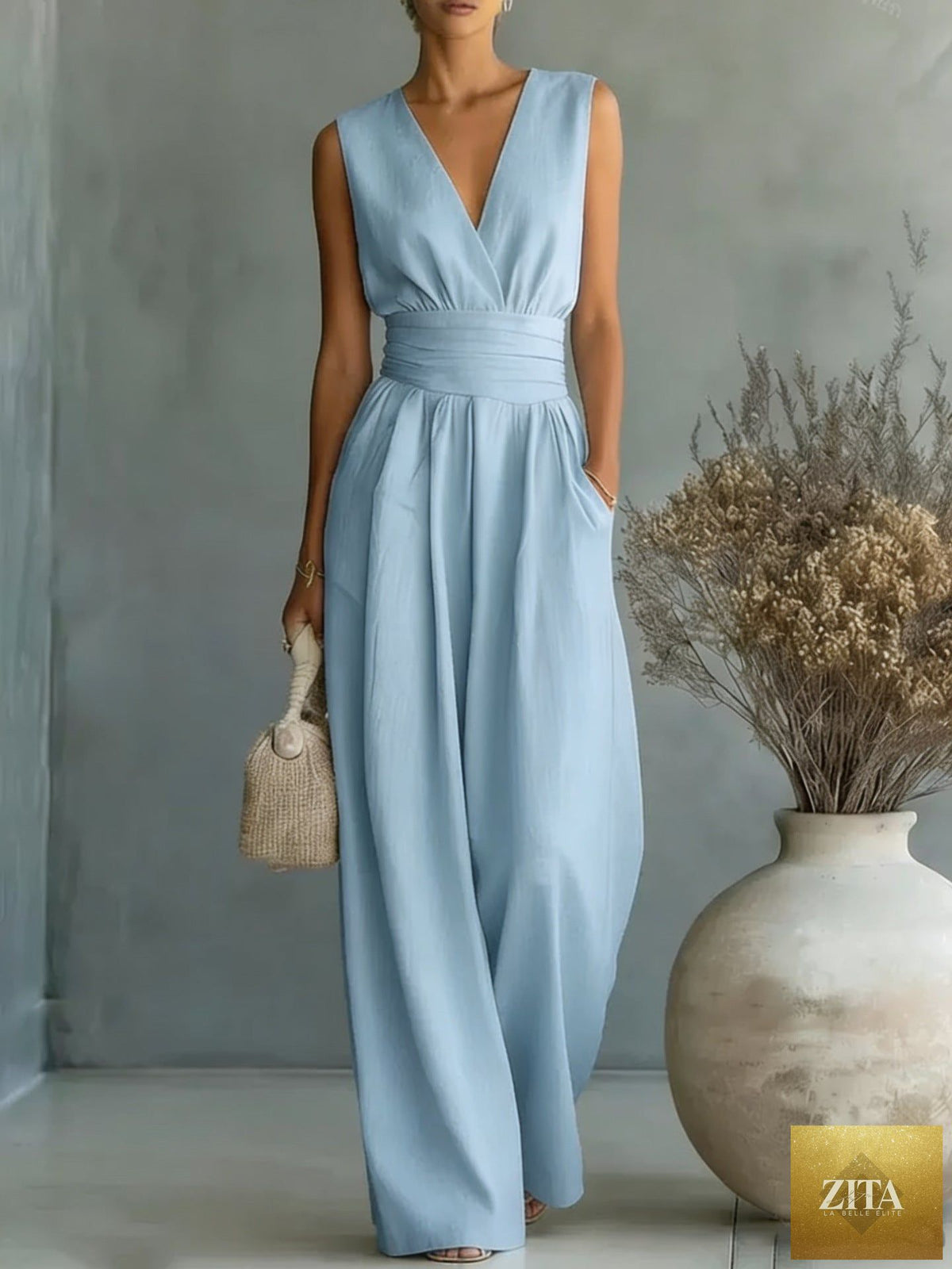 Women's elegant V-neck sleeveless jumpsuit by Zita La Belle Elite featuring a waist-cinching fit and straight-leg design, casualwear style.