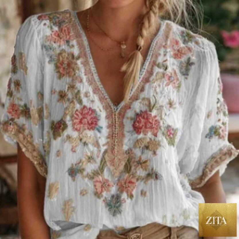 Women's retro V-neck short-sleeve top with 3D print by Zita La Belle Elite, casualwear featuring artistic, colorful design.