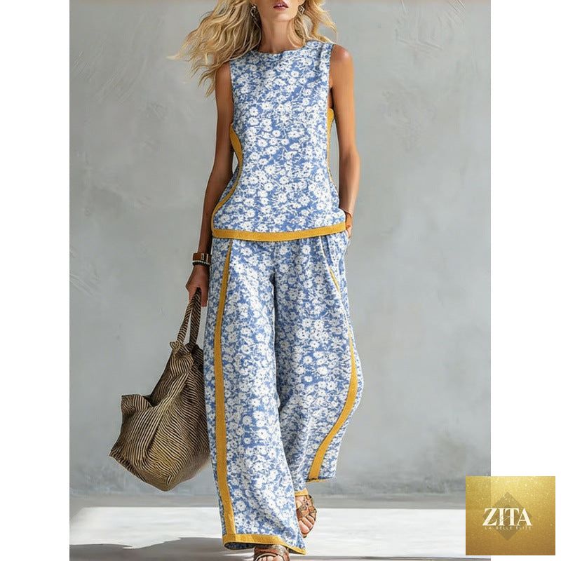 Printed retro sleeveless top and wide-leg pants set from FitiqueFit, showcasing vibrant 12-print design in a two-piece outfit.