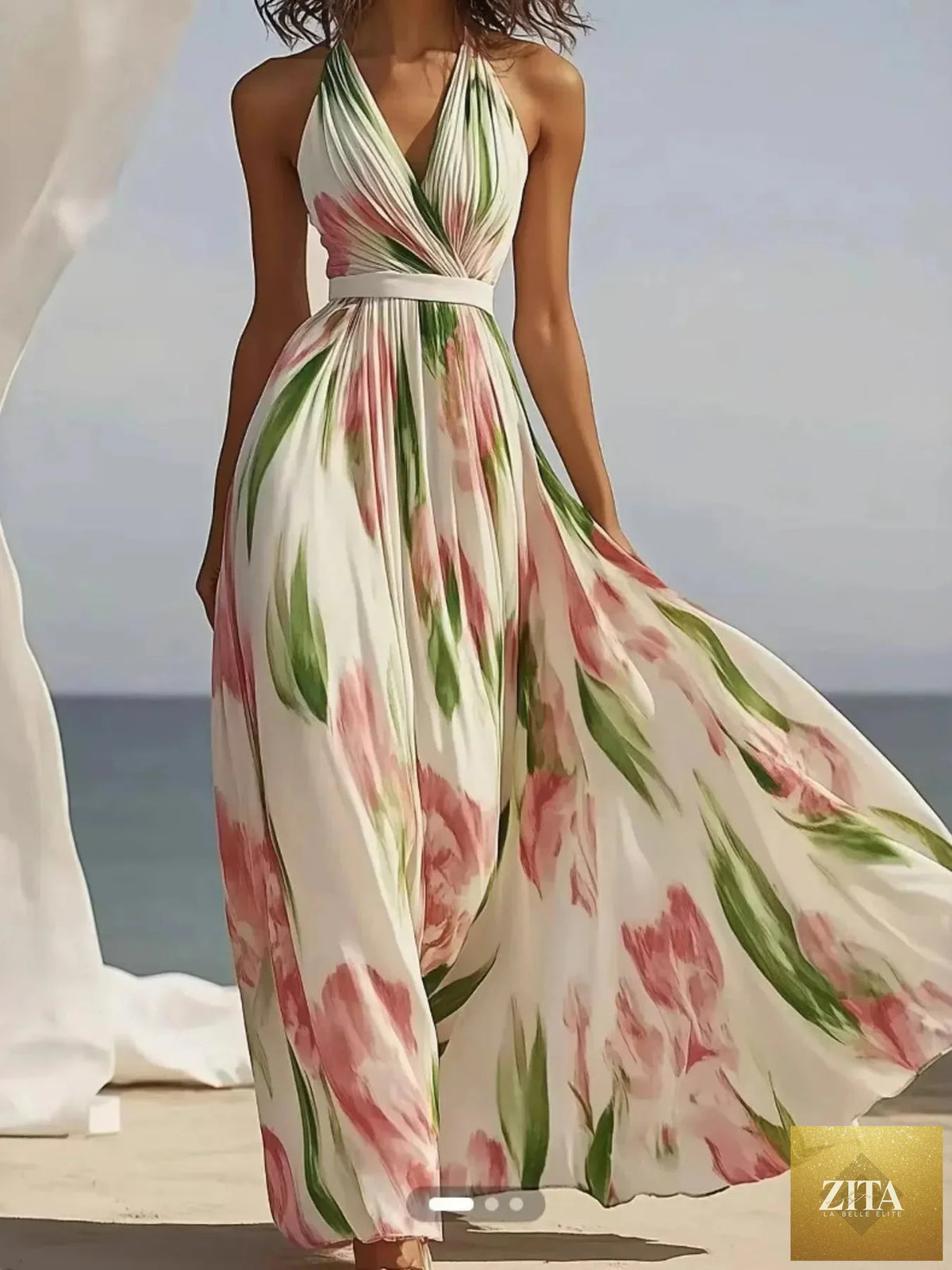 Floral print halter neck maxi dress by Shopiebay featuring a flowing design and vibrant floral pattern.