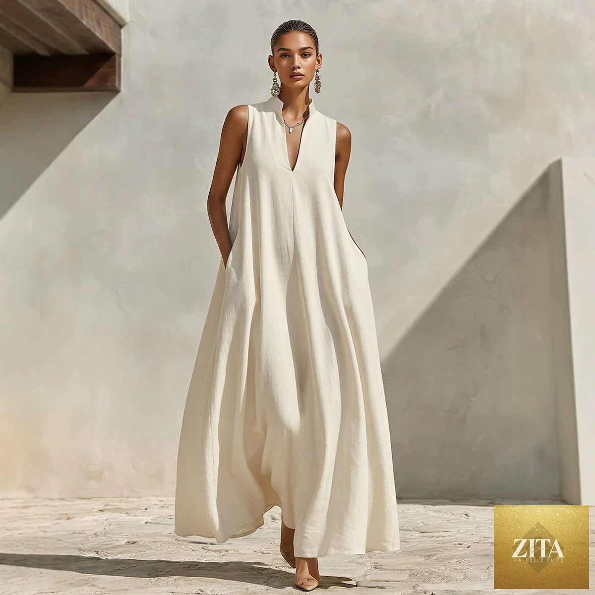 Linen blend sleeveless maxi dress with stand collar in five colors, displayed on a hanger, from FitiqueFit.