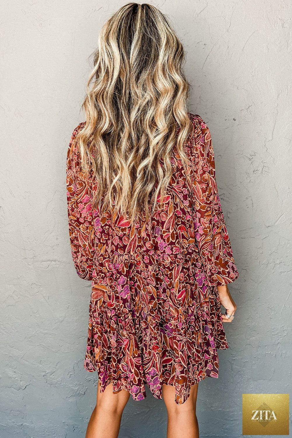 Red floral print long sleeve mini dress with shirred high neck and loose fit, from Wild and Free Boutique.