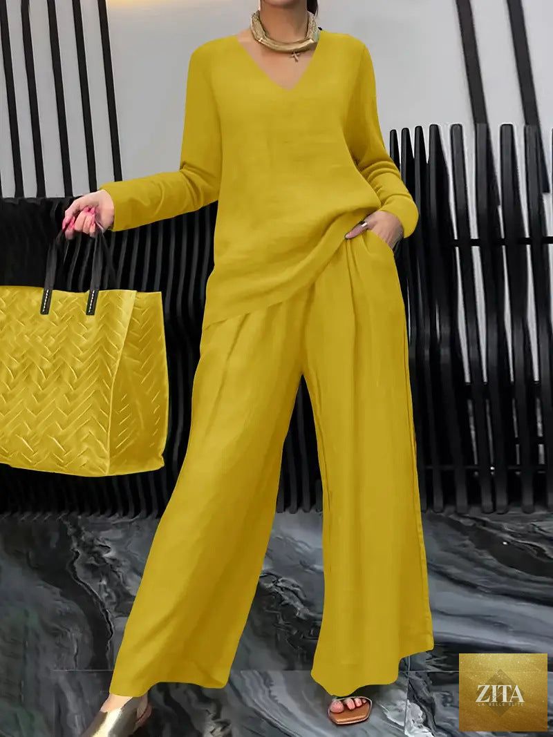 FitiqueFit solid color long sleeve top and pants two-piece travel set, relaxed fit, soft fabric, casual comfortable style.