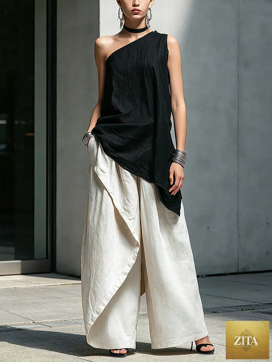 Zita La Belle Elite women's one-shoulder asymmetric sleeveless top, black with stylish draped design and fitted silhouette.