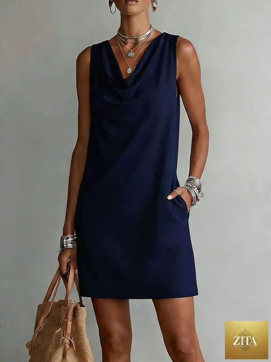 Women's off-shoulder sleeveless casual pullover midi dress by FitiqueFit, shown hanging on a clothing rack.