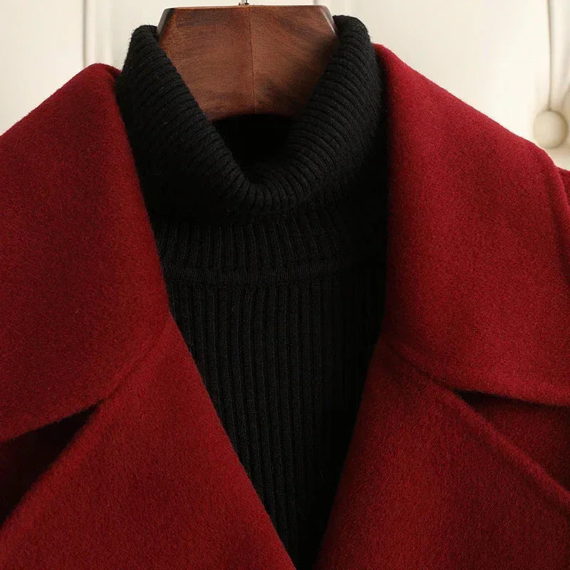 Elegant Femstylo Korean wool coat for women in autumn and winter, stylish jacket with warm, textured fabric and classic design.