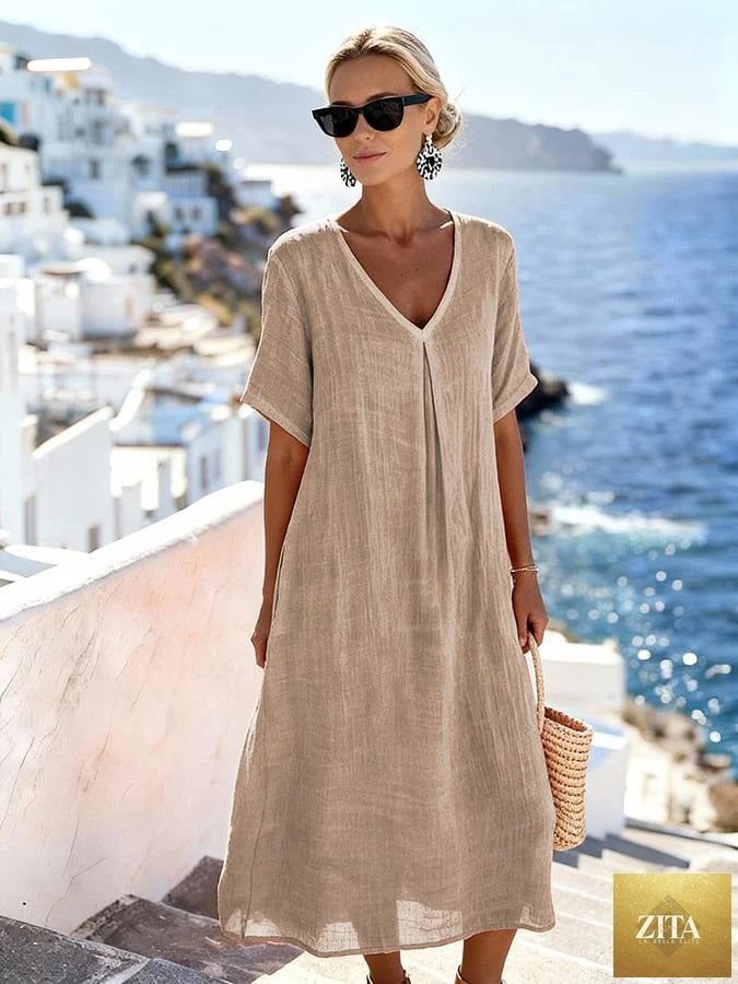 Patchwork asymmetrical maxi dress by FitiqueFit featuring a relaxed V-neck style and flowing design.