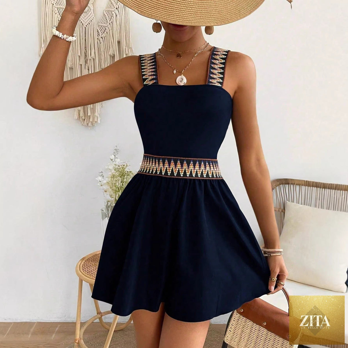 Women's sleeveless wide-leg jumpsuit with cinched waist, casualwear by Zita La Belle Elite, perfect for resort-style summer looks.