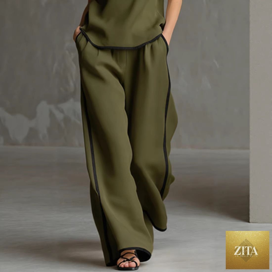 Women’s sleeveless V-neck wide-leg pants set by Zita La Belle Elite, casualwear featuring a stylish V-neck top and flowy wide-leg pants.