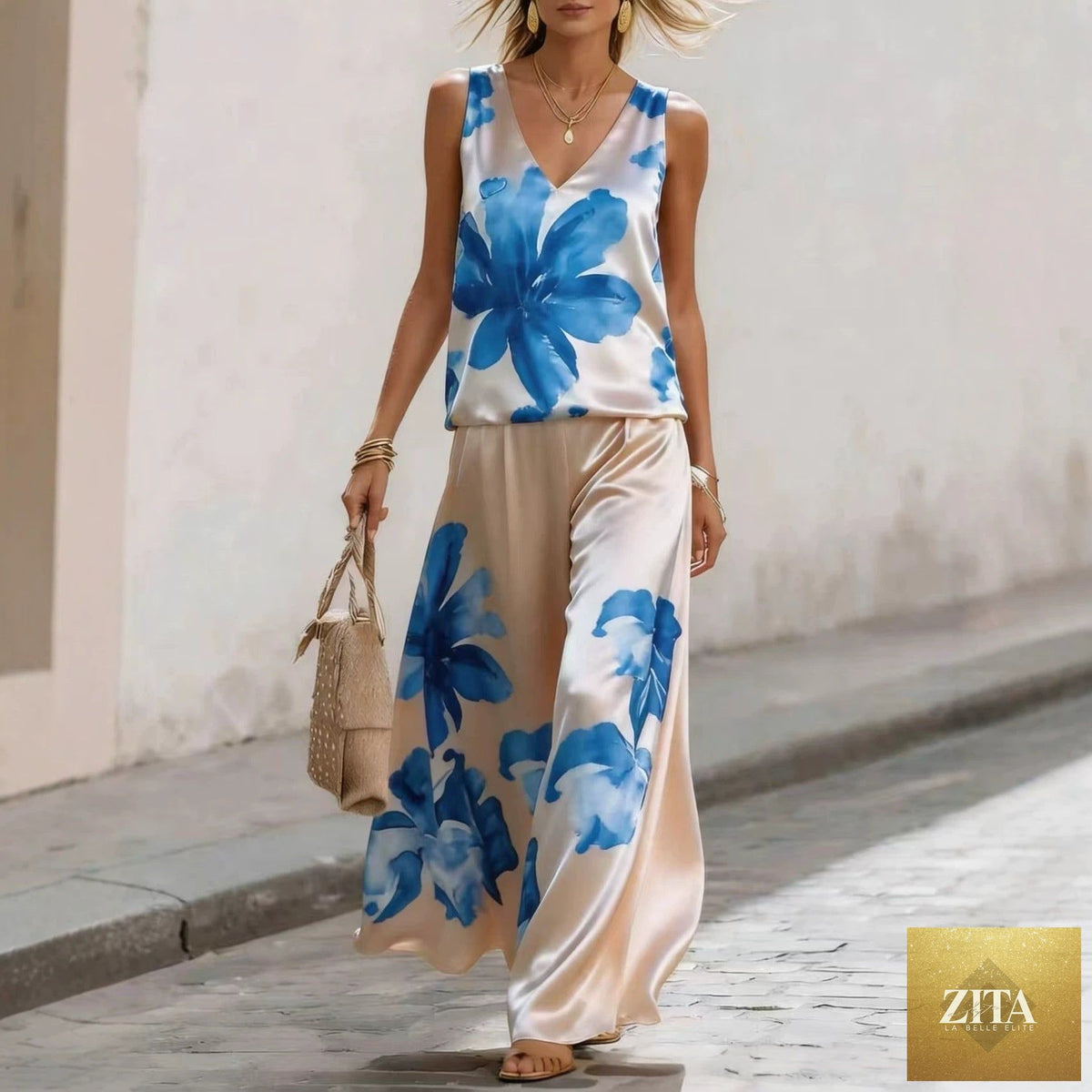 Women's sleeveless floral printed vest and pants two-piece set by Zita La Belle Elite, featuring vibrant flower patterns and casual fit.