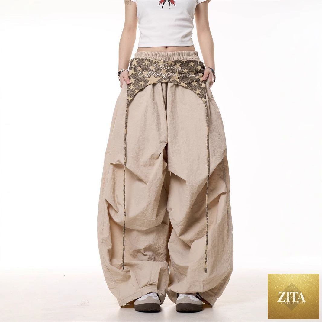 Women's relaxed casual American-style layered cargo pants with tie details, featuring multiple pockets and a comfortable fit.