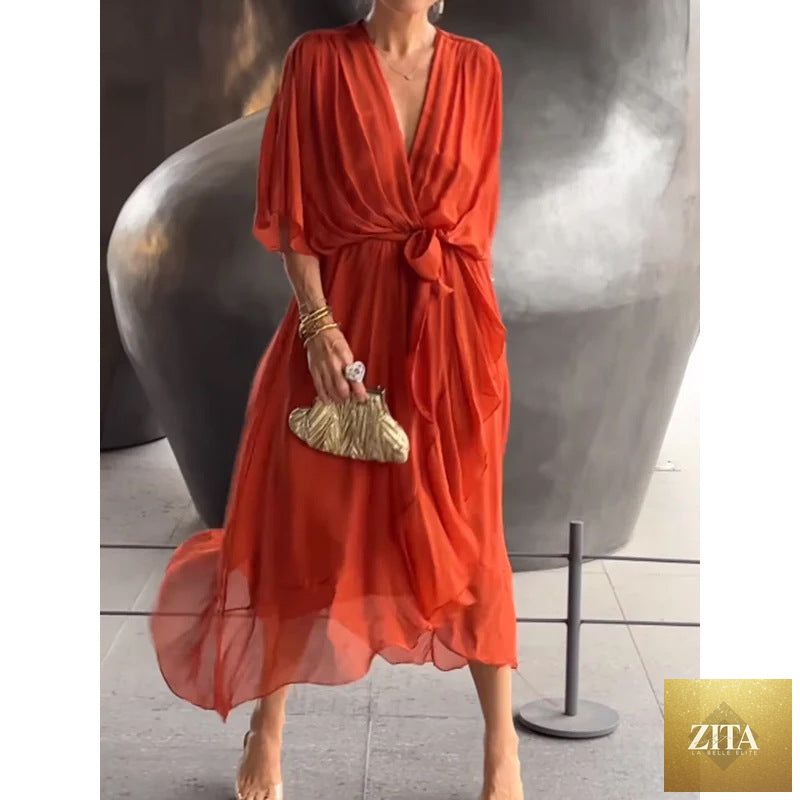 FitiqueFit Batwing Sleeve V-Neck Midi Dress with tied irregular hem, flowing fairy dress style, elegant and stylish.