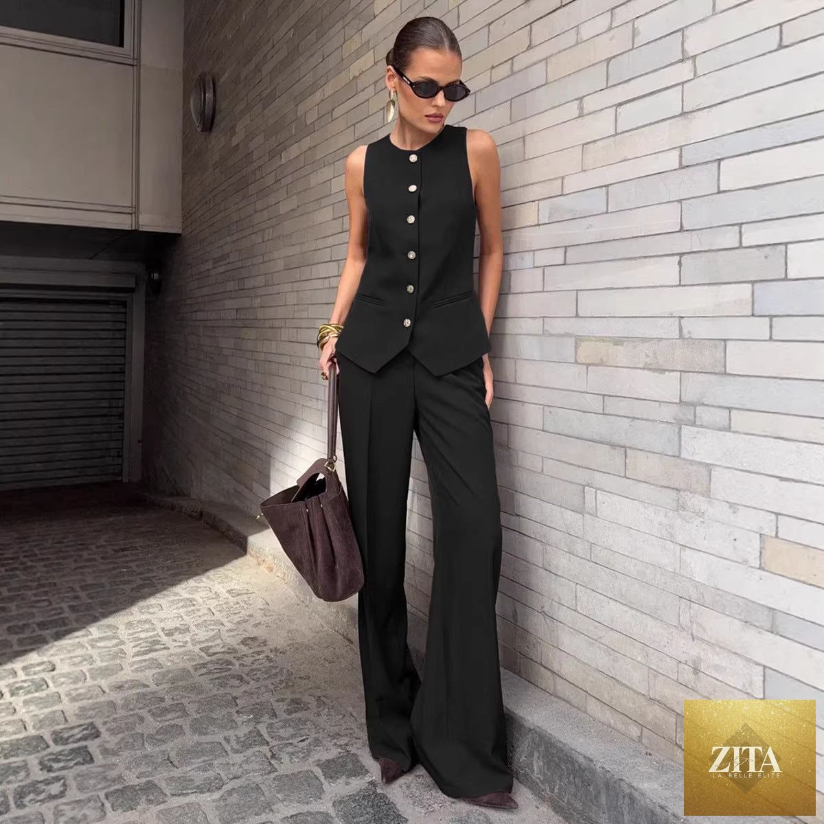 Women's elegant sleeveless vest and wide-leg pants set by FitiqueFit, casual office wear, featuring a stylish sleeveless vest and flowy pants.